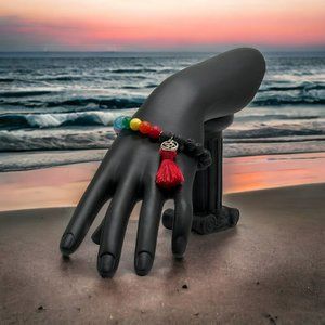 Shakra Bracelet With Lava Stones, A Red Tassel, AUM Symbol & Shakra Stones